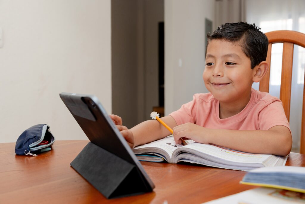 Hispanic,Boy,With,Distance,Education,-,Happy,Child,Doing,His thumbnail